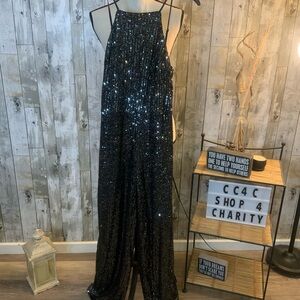 Black Sequin Halter Jumpsuit. Size M